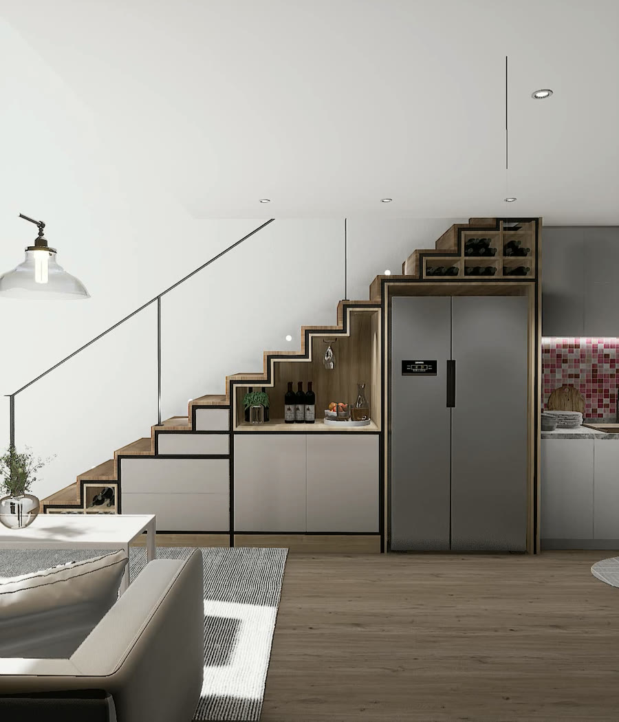 Completed space: the stair carries the appliances and storage the kitchen could not contain